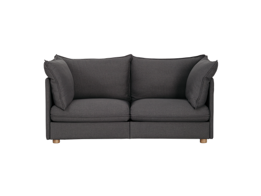 Dark grey two-seater sofa with plush cushions and low wooden legs, ideal for modern living room design.