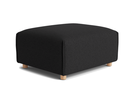 Dark grey ottoman with a rectangular shape and wooden legs. Perfect for modern living rooms or lounge areas.