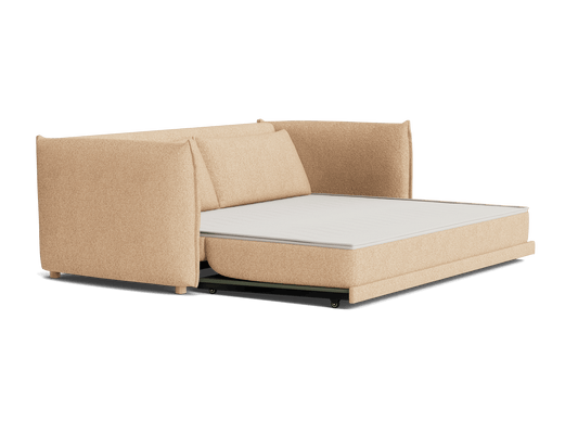 Beige corner sofa with a pull-out mattress, featuring minimalist design and plush cushions. Perfect for versatile living room furniture.