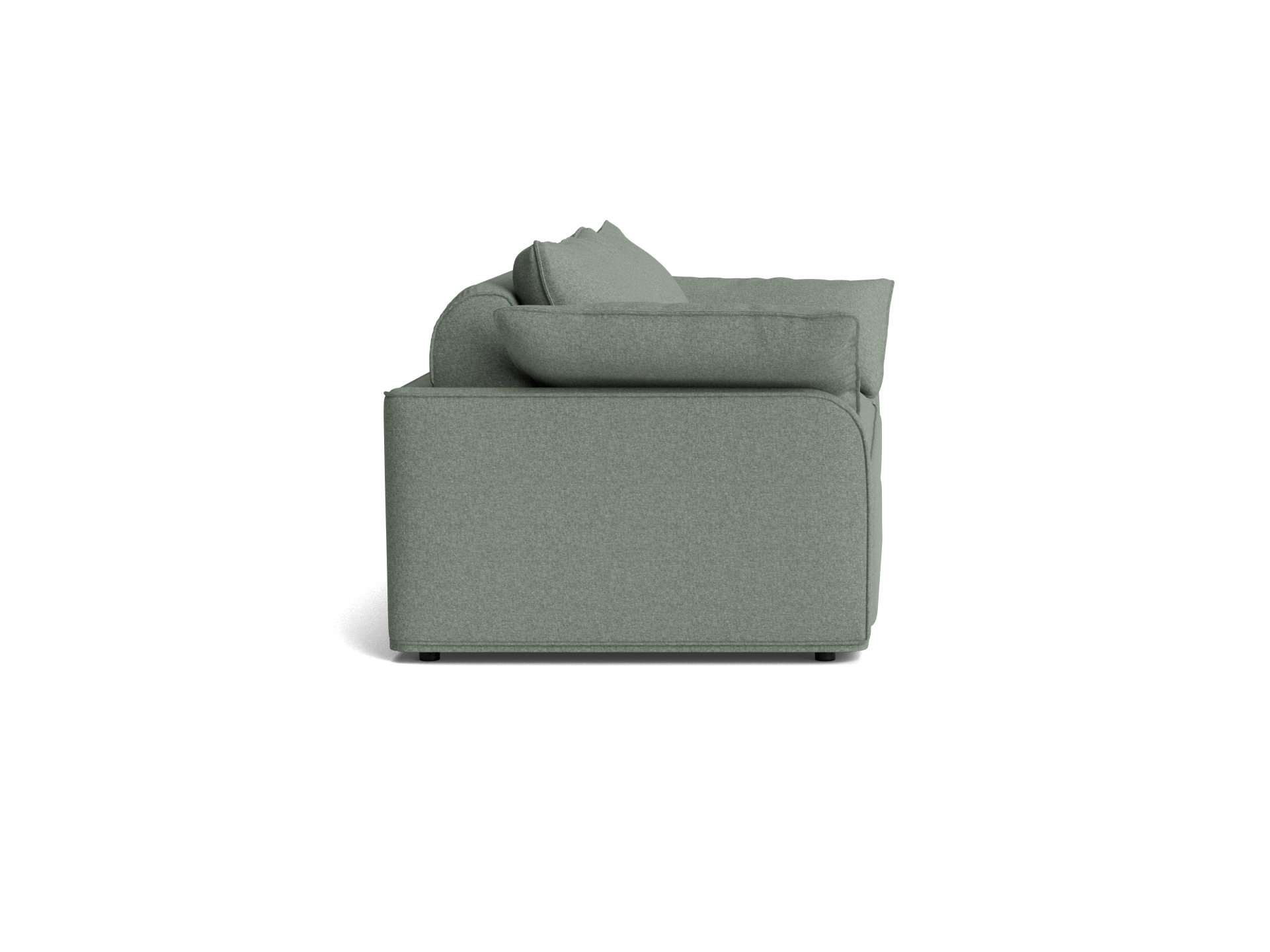 Side view of a modern light green fabric sofa with a cushioned back and minimalist design.