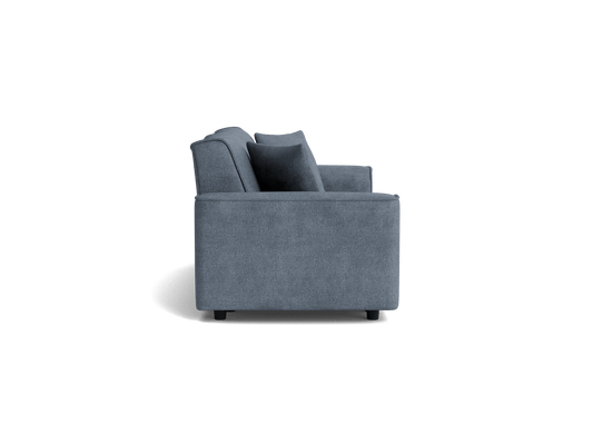 Side view of a dark grey, modern fabric sofa with plush cushions and low profile, set against a plain white background.