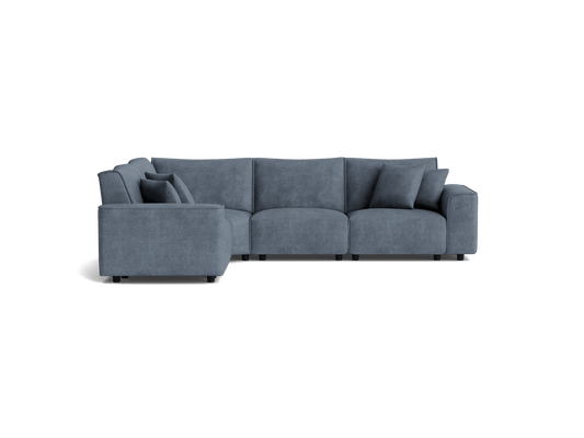 Dark grey sectional sofa with cushioned seats and backrests, featuring four throw pillows, designed for modern living spaces.