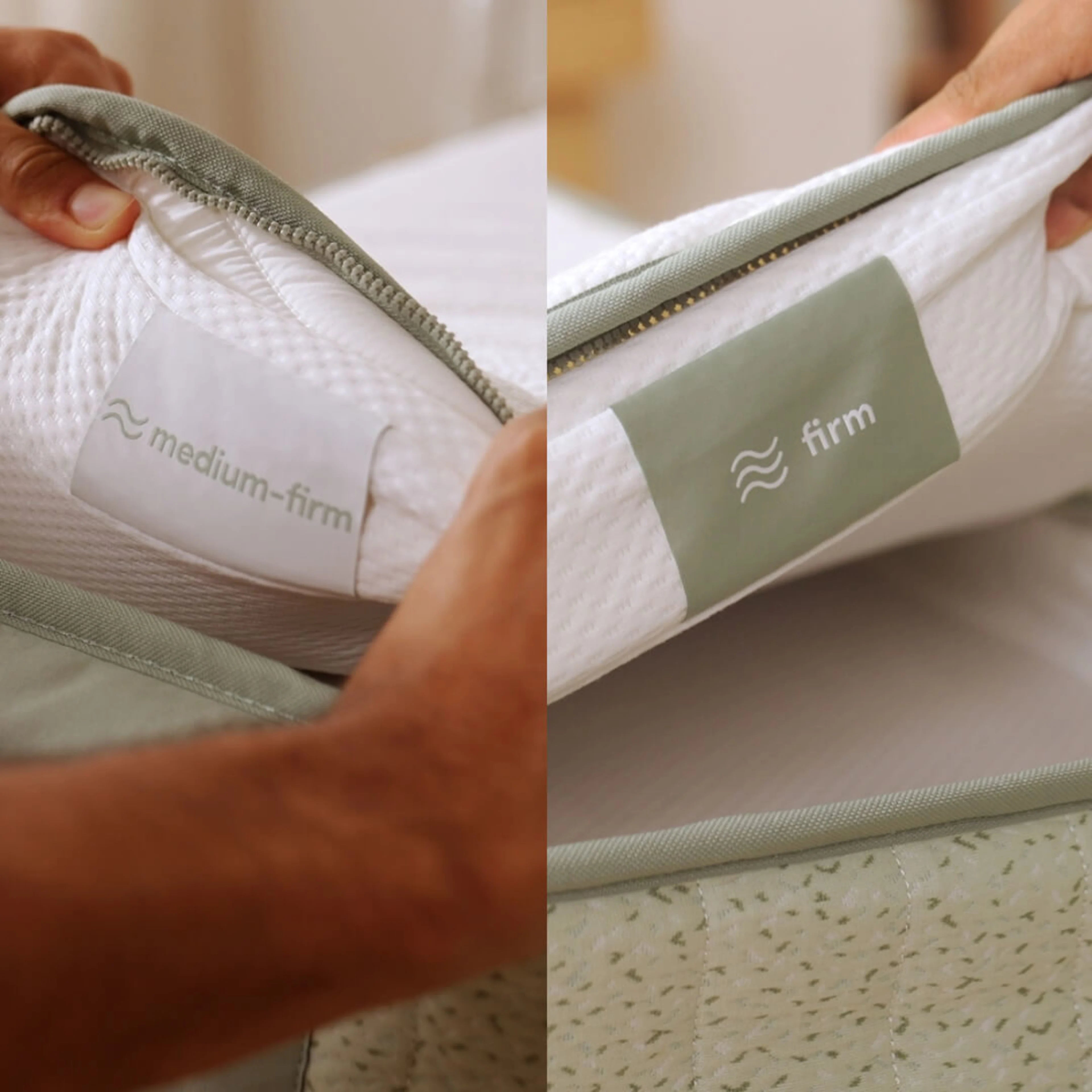 Close-up of a mattress with a dual firmness feature. One side is labelled medium-firm, the other firm. Hands demonstrate the firmness levels.