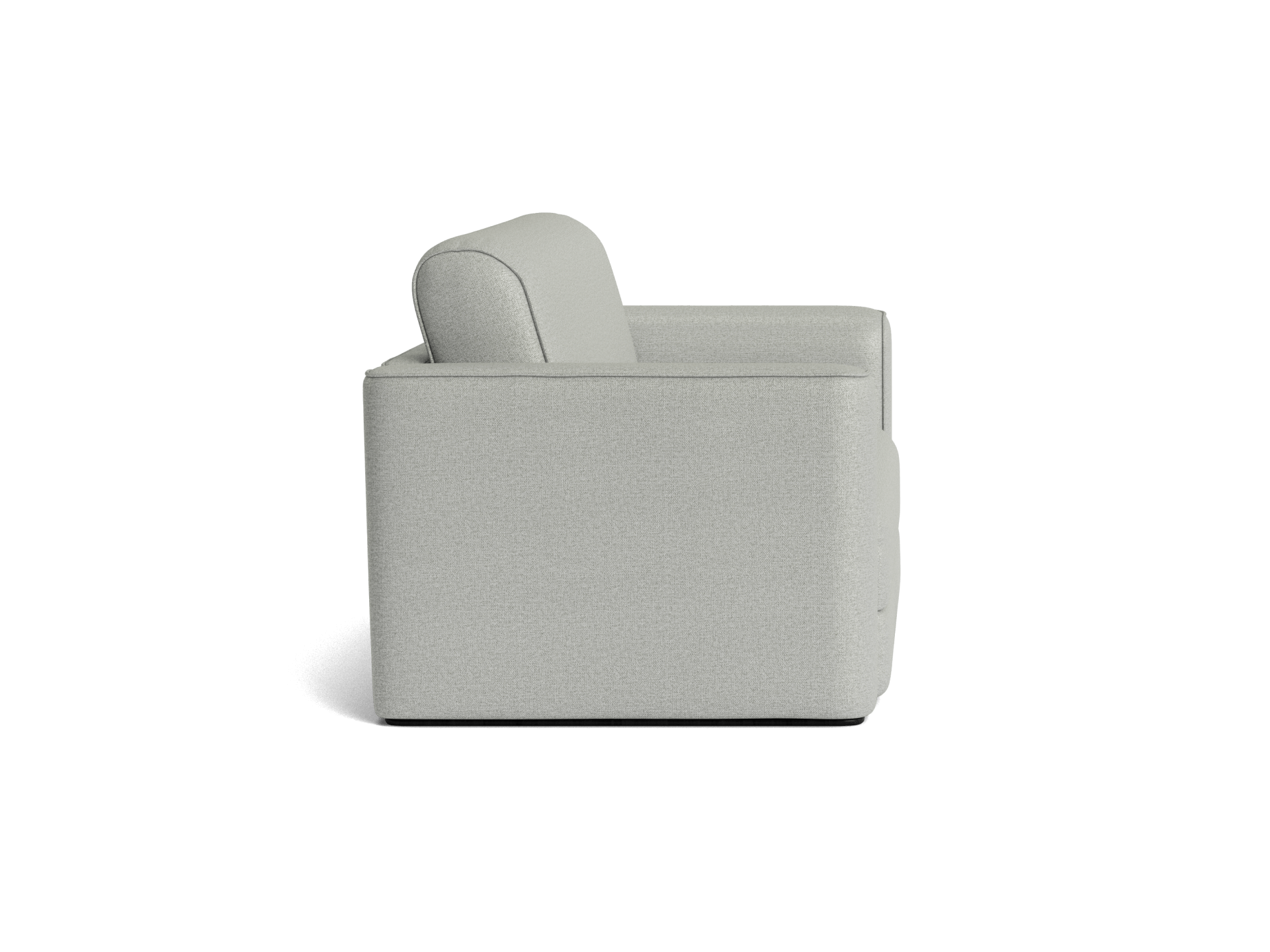 Side view of a light grey armchair with a boxy design and plush backrest, set against a plain backdrop.