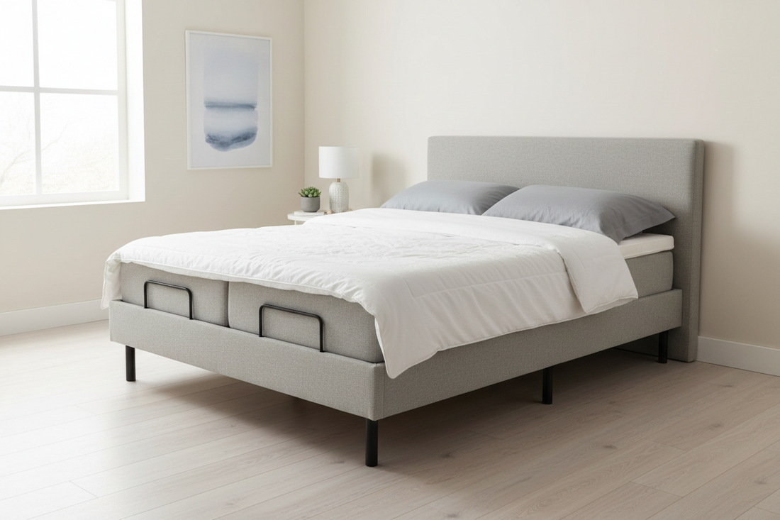 A gray adjusted bed place in clean wide room