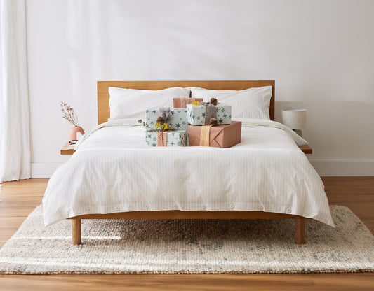 A beautiful Koala bed in a bright, clean bedroom with Christmas gifts