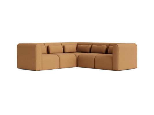 Tan L-shaped sectional sofa with plush cushions and rounded arms. Modern design ideal for living rooms.