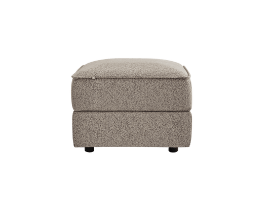 Light grey fabric ottoman with square shape and cushioned top, on small black wheels.