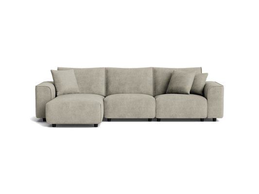 Beige L-shaped sectional sofa with four seat cushions and three matching throw pillows. Modern design suitable for living room décor.