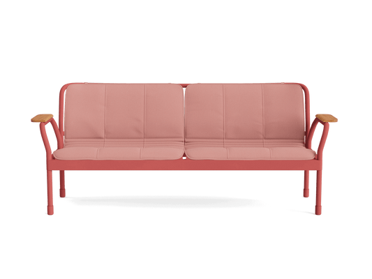 Pink two-seater sofa with a metal frame and wooden armrests, featuring minimalistic design and cushioned seating.