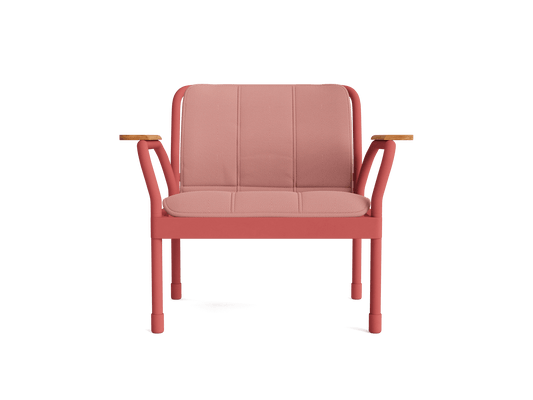 Coral armchair with a padded seat and backrest, featuring wooden armrests and metal legs. Perfect for modern interiors.