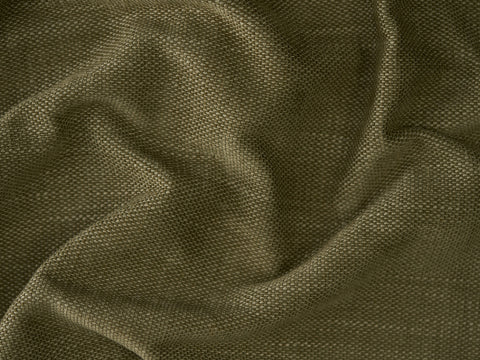 Close-up of loosely draped olive green textured fabric showing natural folds and weave pattern