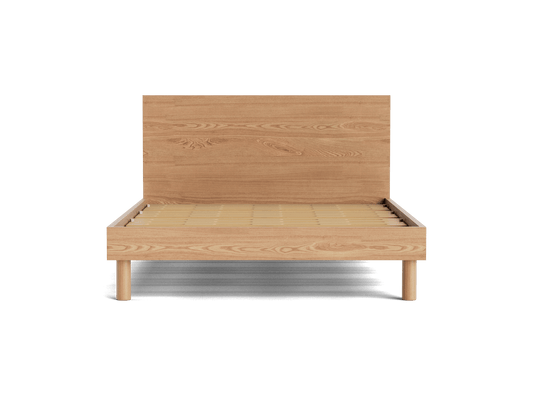 Wooden bed frame with a slatted headboard and minimalist design in light brown wood. Simple, modern aesthetic.