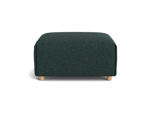 Dark green upholstered ottoman with wooden legs, rectangular shape, minimalist design. Ideal for living room furniture and decor.