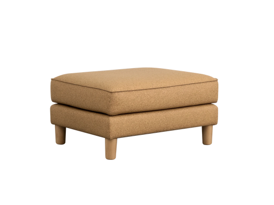 Tan upholstered ottoman with a rectangular shape and four short wooden legs, offering a modern and minimalist look.