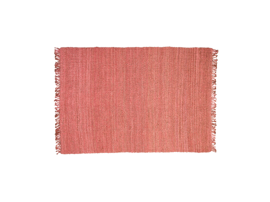 Rectangular pink woven rug with fringed edges.