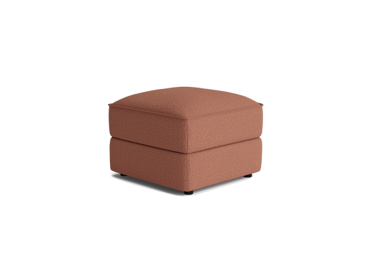 Square light brown ottoman with a cushioned top and textured fabric, ideal for living room seating or extra footrest.