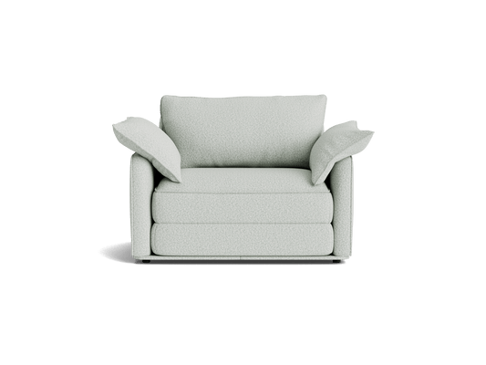 Light grey two-seater sofa with plush cushions and rounded armrests. Simple, modern design on a plain background.