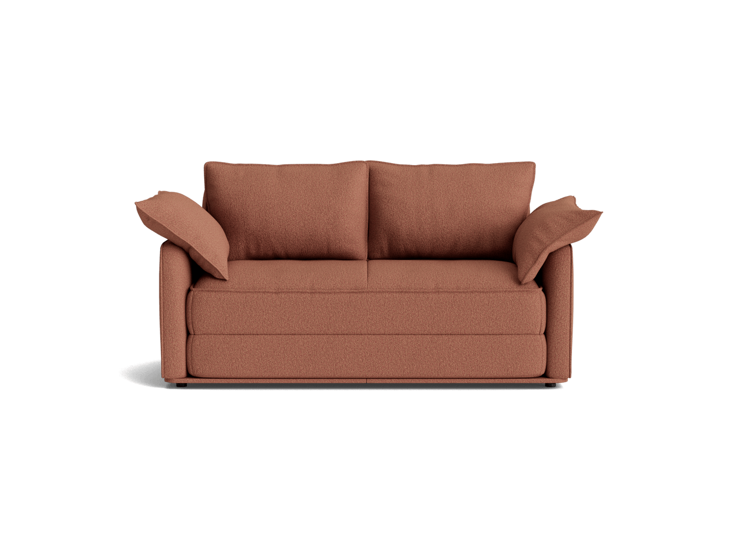 Rust-coloured sofa with two large back cushions and two side cushions. Simple, modern design suitable for living rooms.