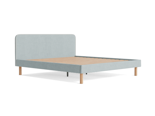 Light grey upholstered bed frame with a simple headboard and wooden legs, featuring a slatted mattress base.