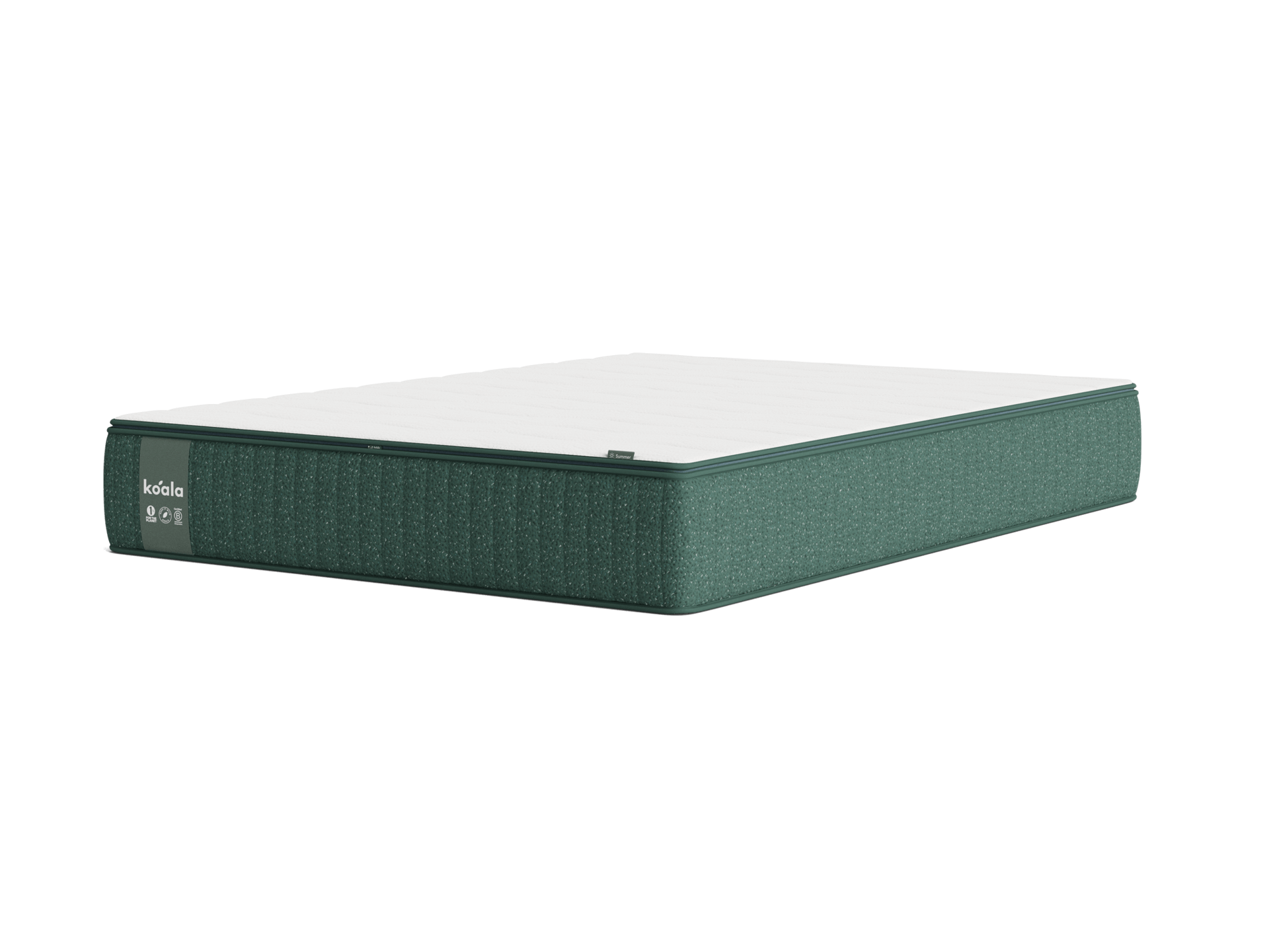 Green mattress with a white top and textured sides, placed against a plain background. Labels and patterns visible on the side.