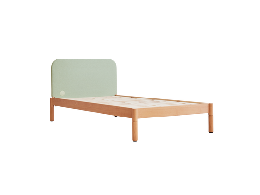 Single wooden bed frame with light green fabric headboard, minimalist design.