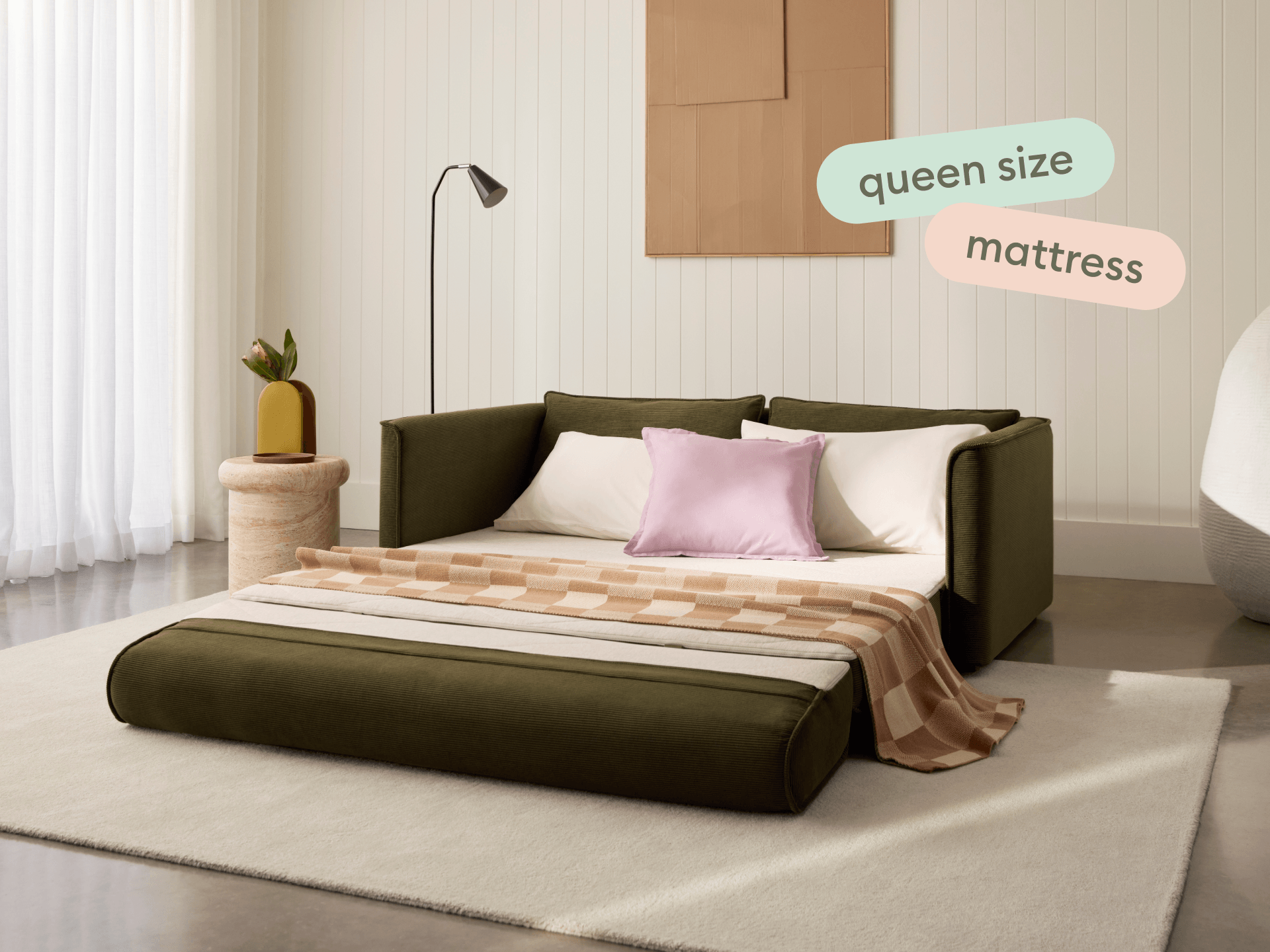 Koala Sofa Bed Queen in olive green corduroy front view on grey studio background