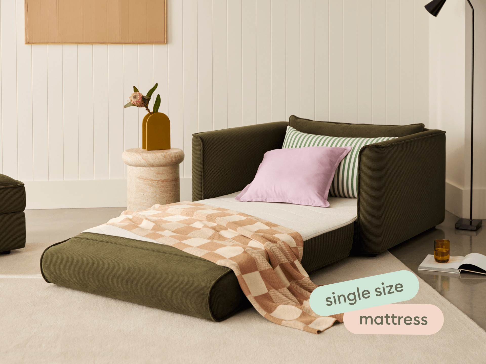 Koala Sofa Bed Single in olive green corduroy studio product shot on grey background