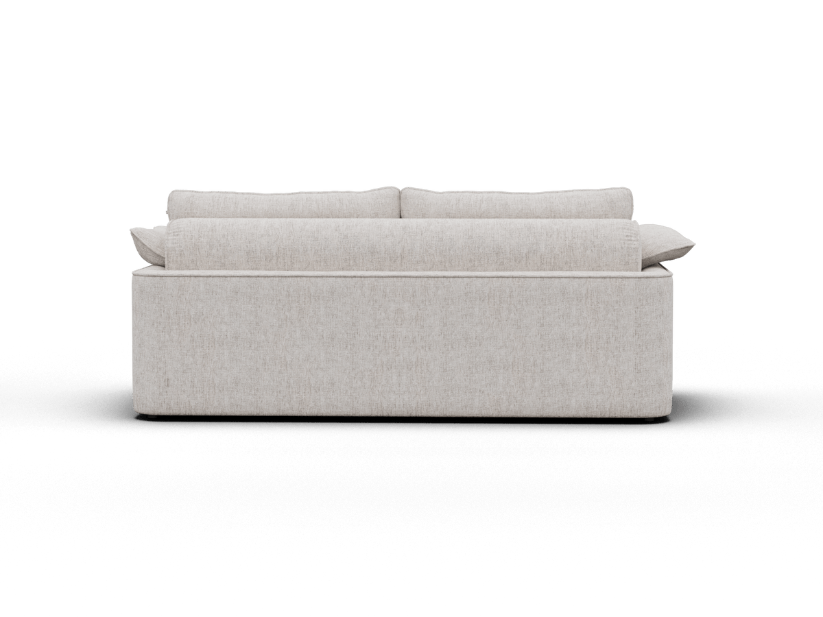 Koala Cushy Sofa Bed in sandstone studio rear three-quarter view