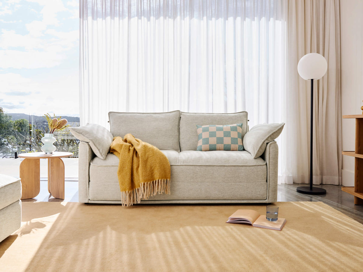 Koala Sofa Bed 4th Gen in Silver Sand in a styled living room