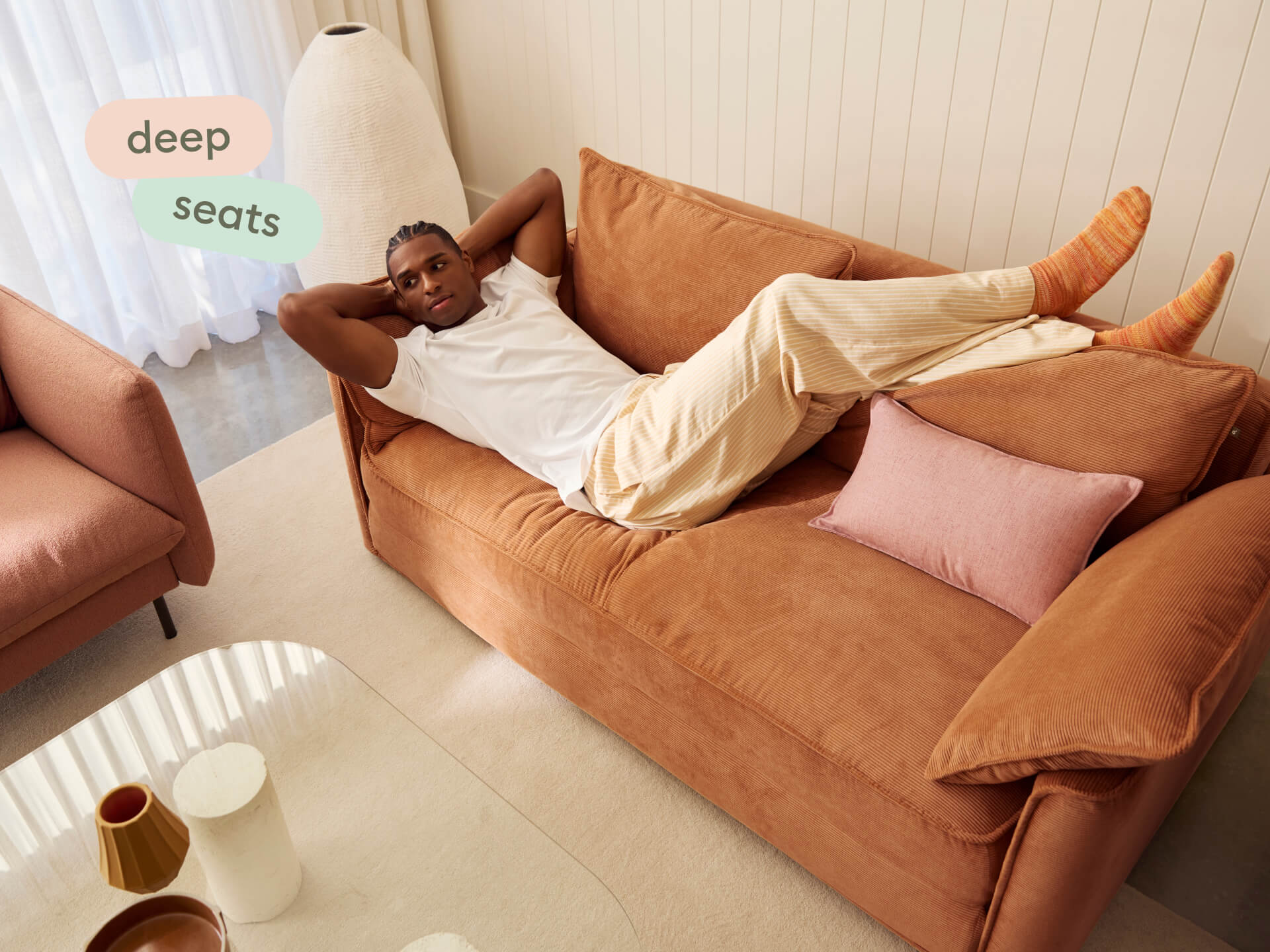 Koala Sofa Bed Double in terracotta corduroy front view on grey studio background