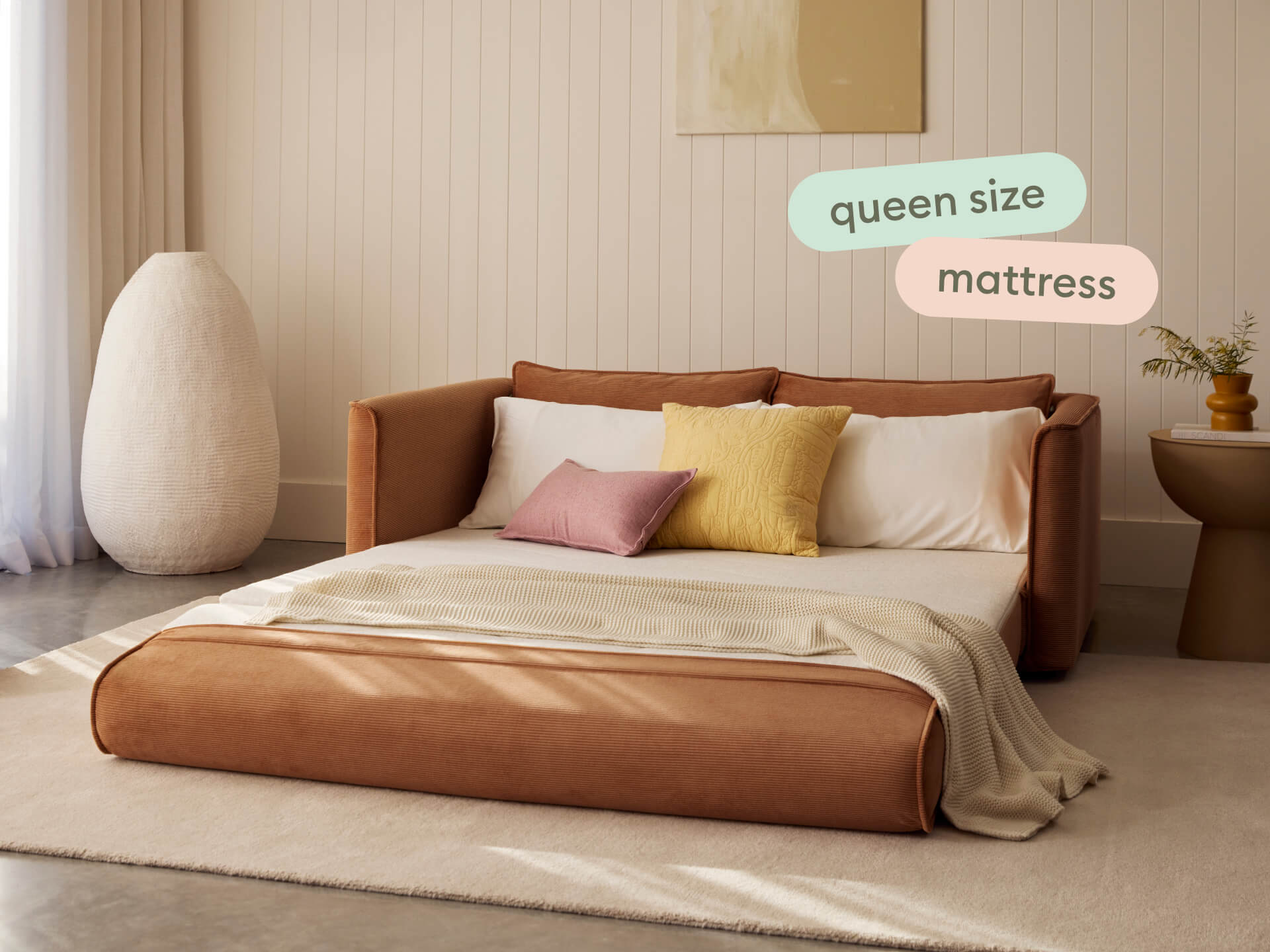 Koala Sofa Bed Queen in terracotta corduroy studio product shot on grey background