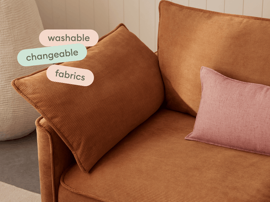 Koala Sofa Bed Single in terracotta corduroy close-up with washable changeable fabrics text overlay
