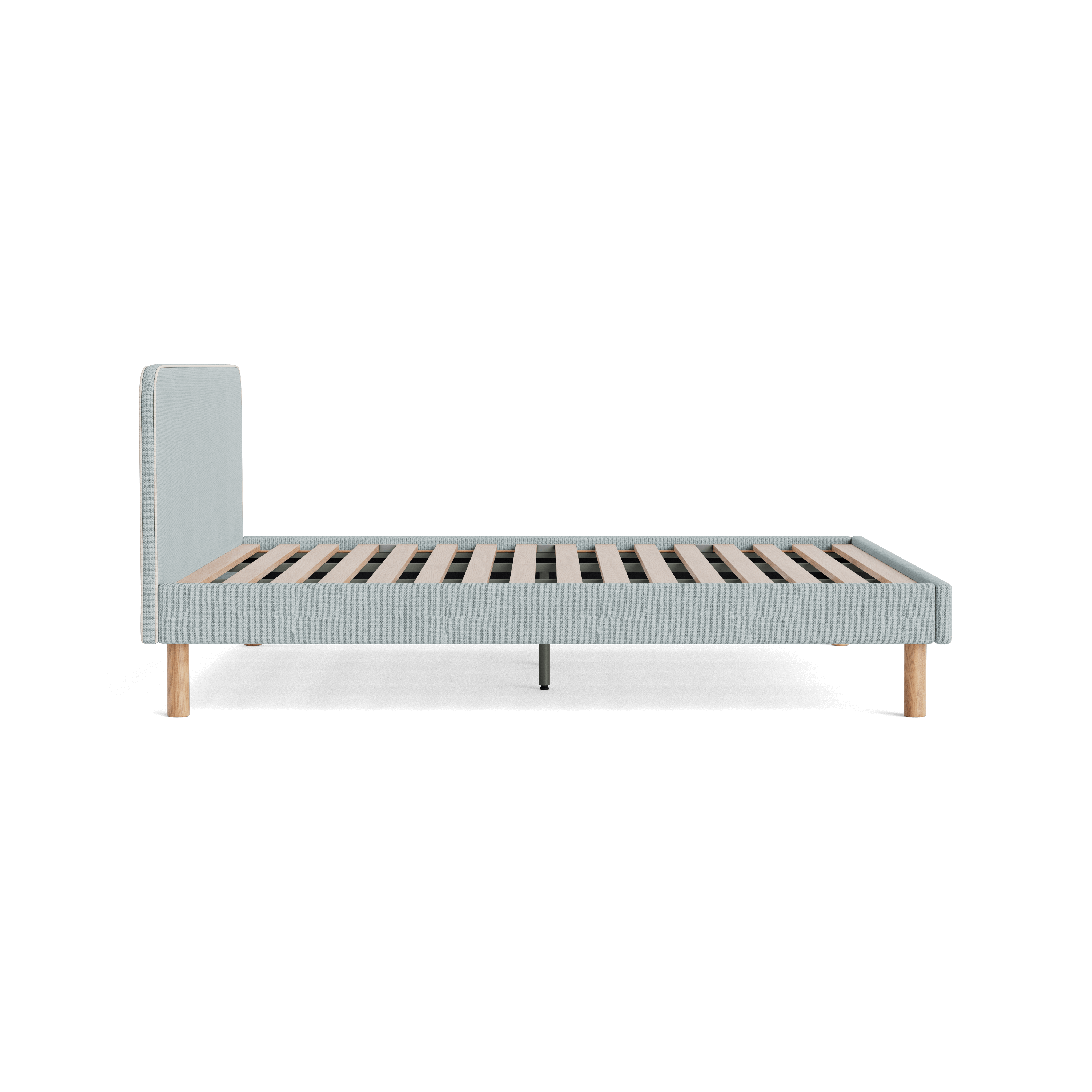 Light grey upholstered bed frame with wooden slats and round wooden legs. Minimalist design, side view. Ideal for modern bedroom decor.