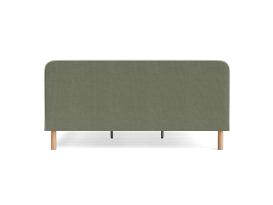 Olive green upholstered bedhead with rounded corners and light wooden legs, viewed from the front.