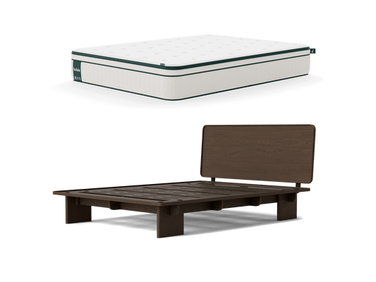 Mattress on dark brown wooden bed frame with high headboard; minimalist bedroom furniture set.