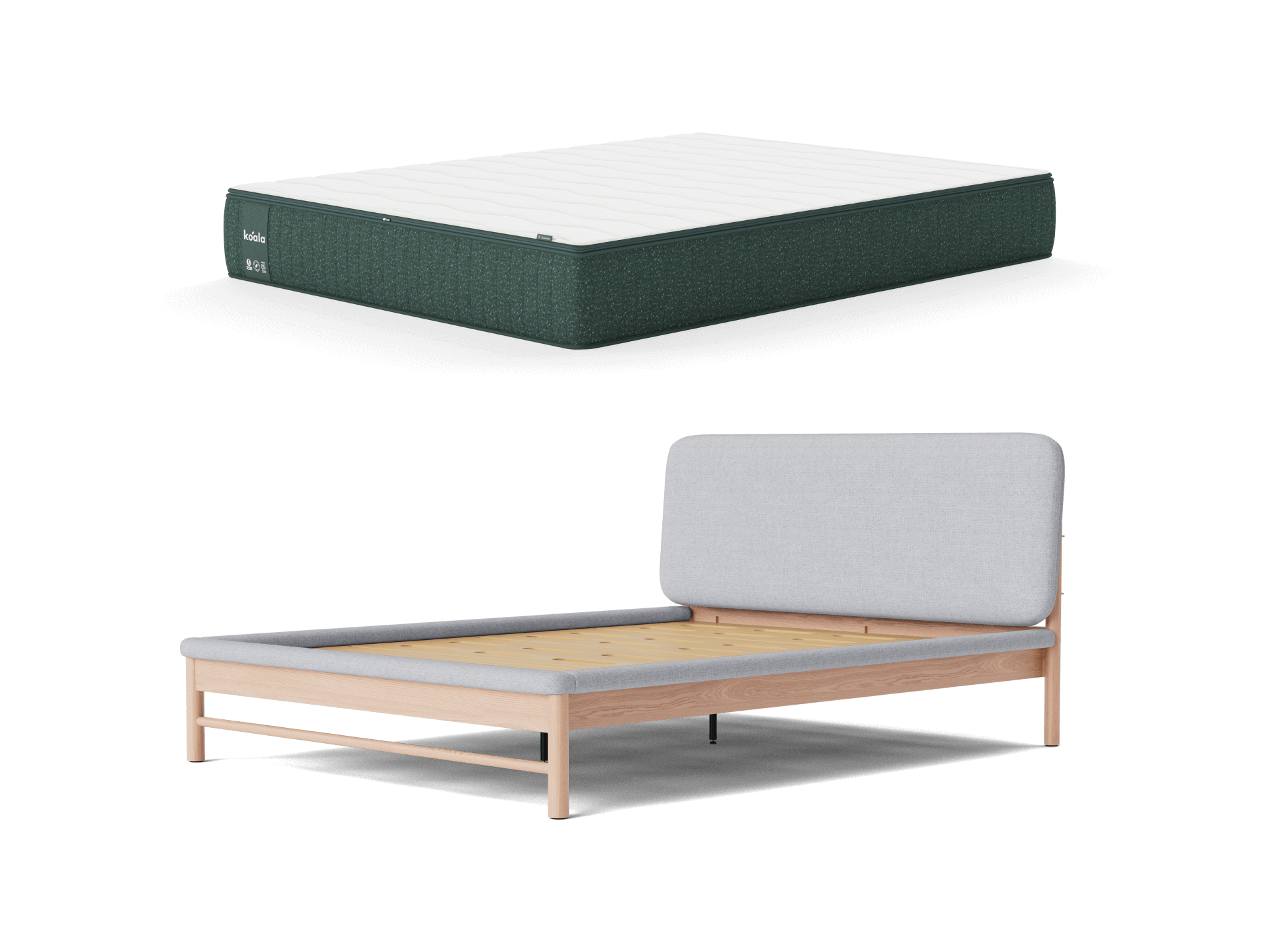 Mattress with a dark grey base and white top, paired with a light wood bed frame featuring a light grey upholstered headboard.