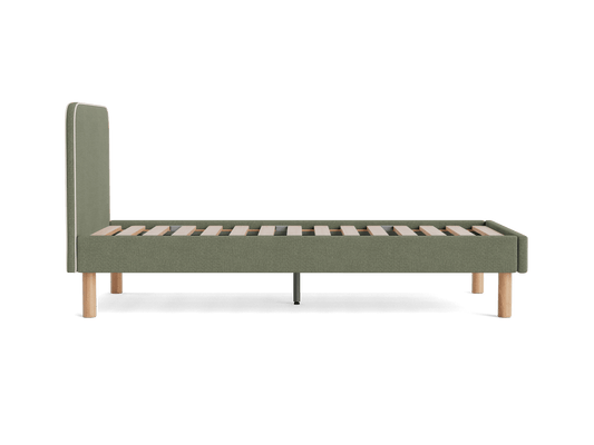 Olive green fabric bed frame with light wood legs, slatted base, and tall, padded headboard. Simple, modern design.