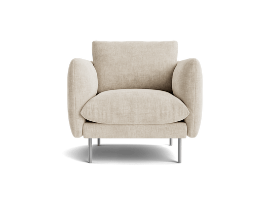 Beige armchair with plush cushions, rounded armrests, and slender metal legs. Modern design, ideal for living room comfort.