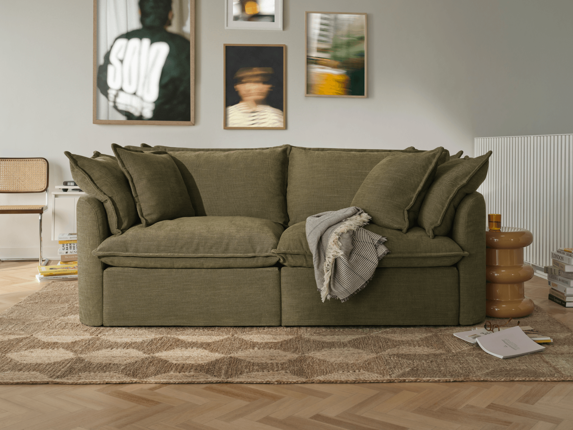 Sage green Koala Tamworth 2-seater sofa in styled living room with cushions and throw