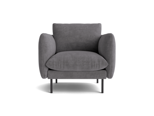 Dark grey armchair with plush cushions and rounded armrests on slim black legs, viewed from the front. Ideal for modern living rooms.