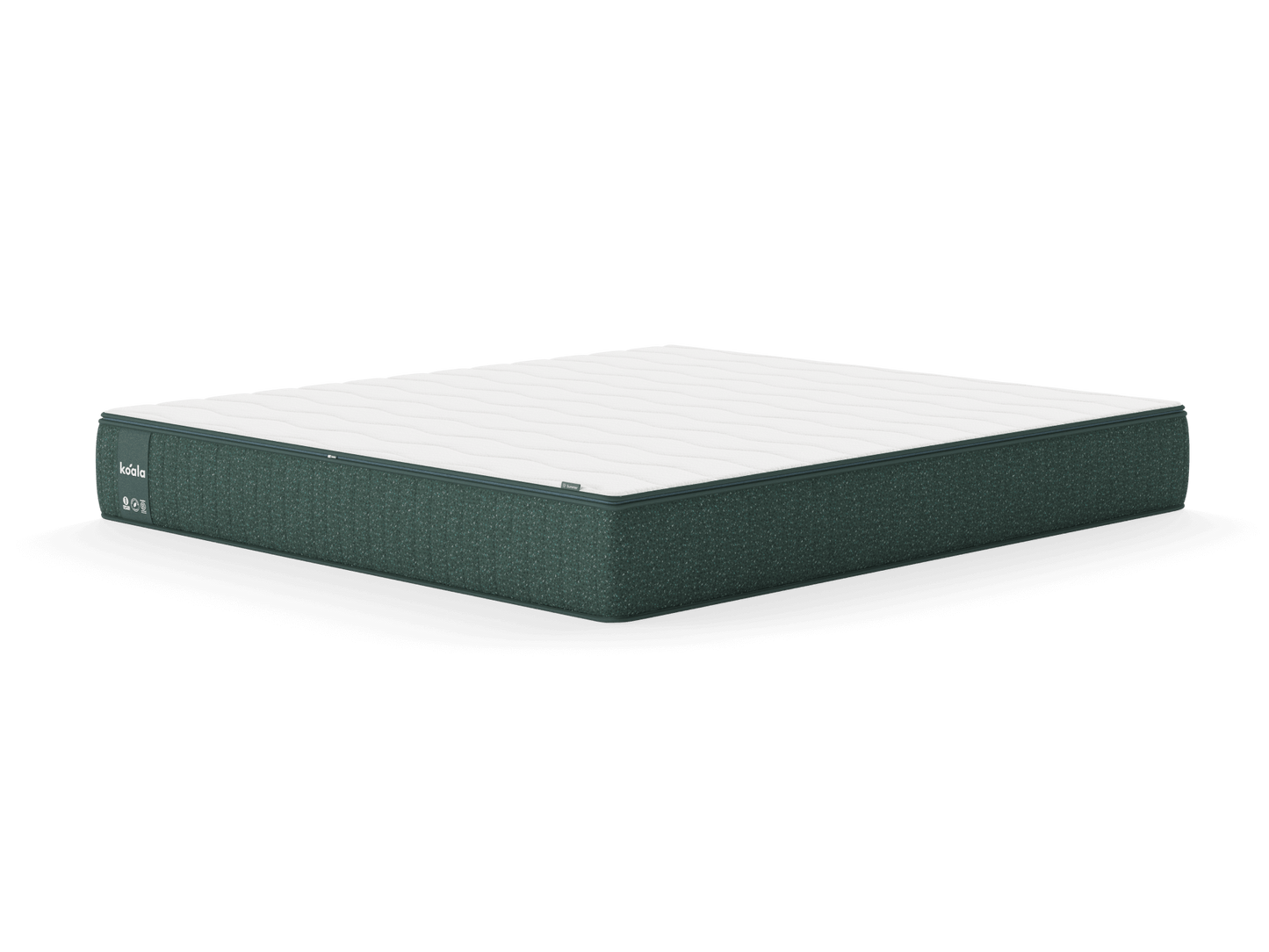 Green and white rectangular mattress with a quilted top. The side panel is dark green, featuring a small branded label.