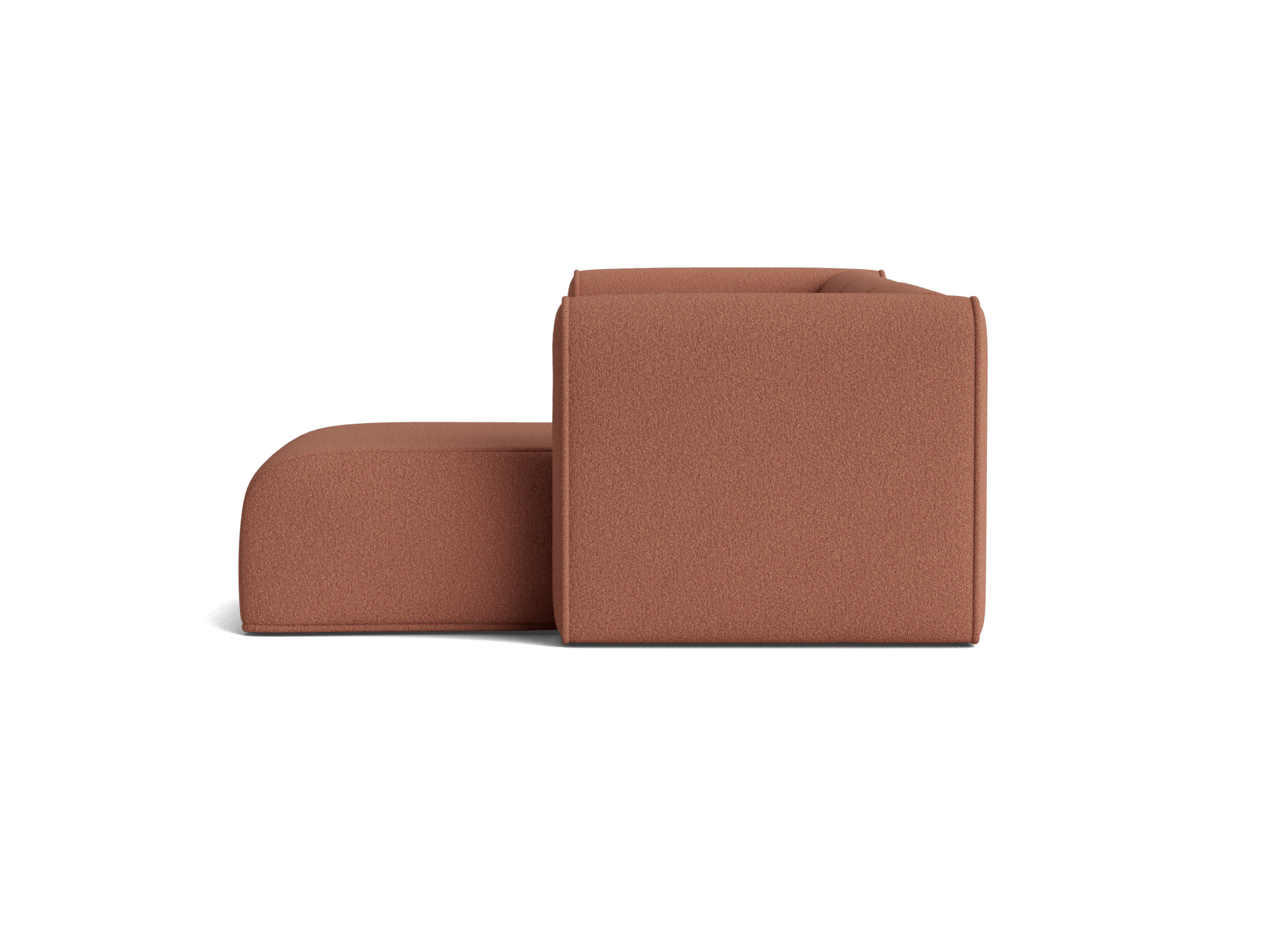 Side view of a brown, modular sofa with a minimalist design and rounded edges, against a plain background.