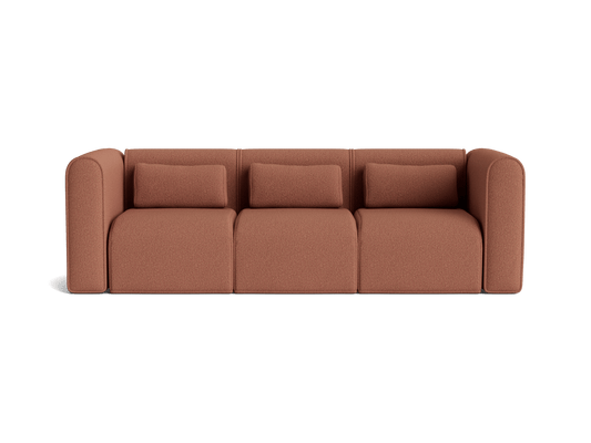 Brown three-seater sofa with minimalist design and plush cushions. Upholstered in fabric with rounded armrests. Contemporary lounge furniture.