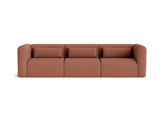 Modern brown three-seater sofa with plush cushions and rounded armrests.
