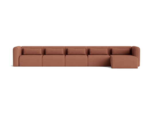 Long brown modular sofa with five cushioned seats, one with chaise lounge extension. Modern design, perfect for spacious living areas.