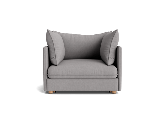 Light grey armchair with square cushions and wooden legs. Modern design, ideal for contemporary living rooms or stylish office spaces.