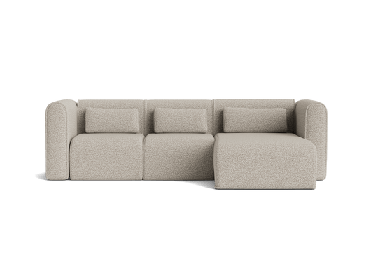 Beige L-shaped sectional sofa with three seat cushions and two back cushions. Modern design with rounded armrests.