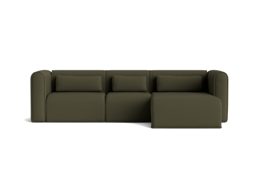 Dark green modular sofa with rounded arms and backrest, featuring three seat cushions and three matching cushions.