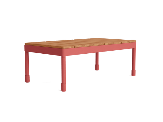 Wooden rectangular coffee table with red legs.